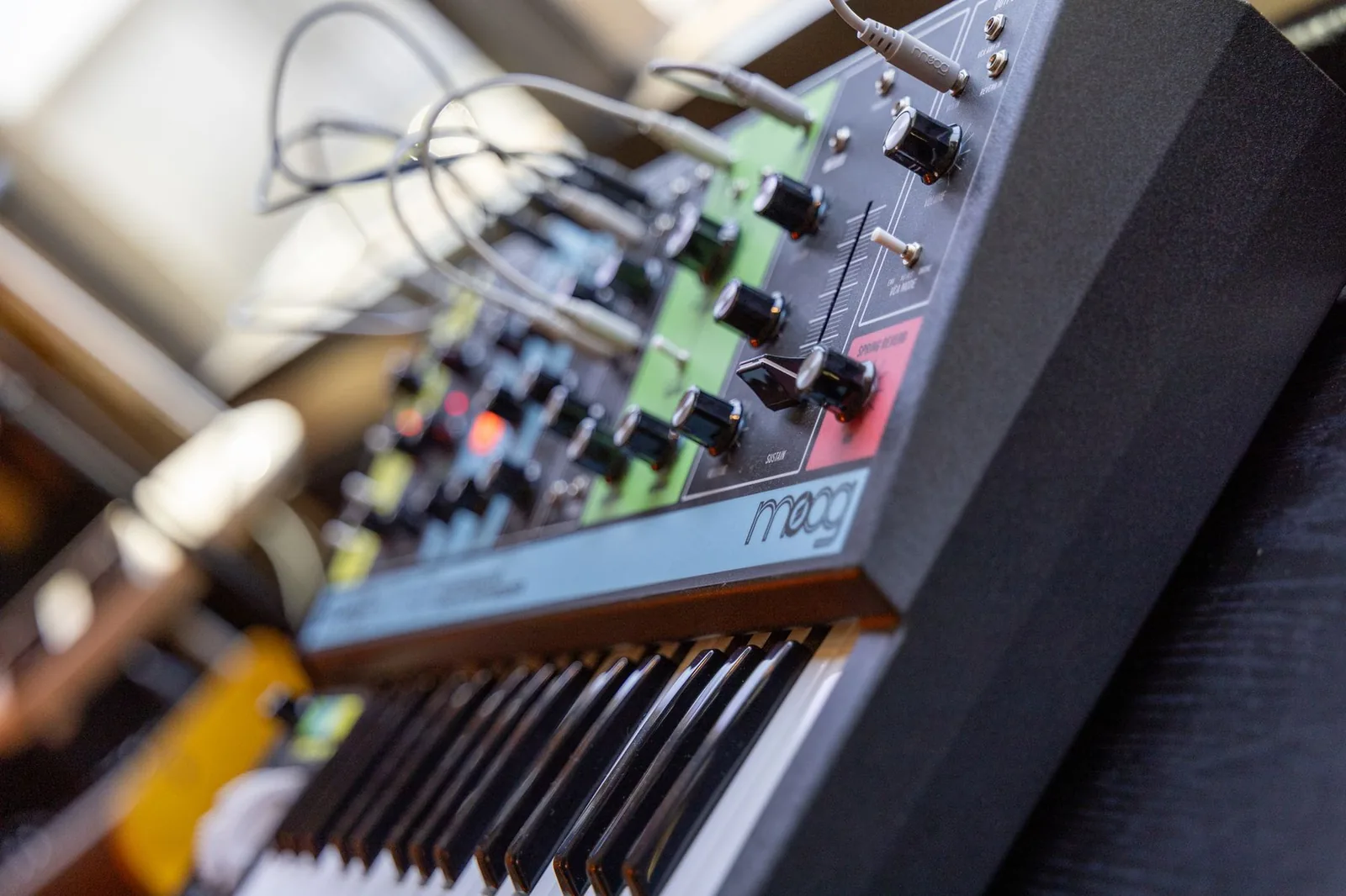 Photo: a Moog Grandmother semi-modular synthesiser with its patch bay